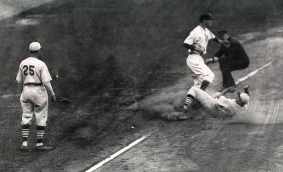 Joe Medwick slides into Marv Owen at 3B.